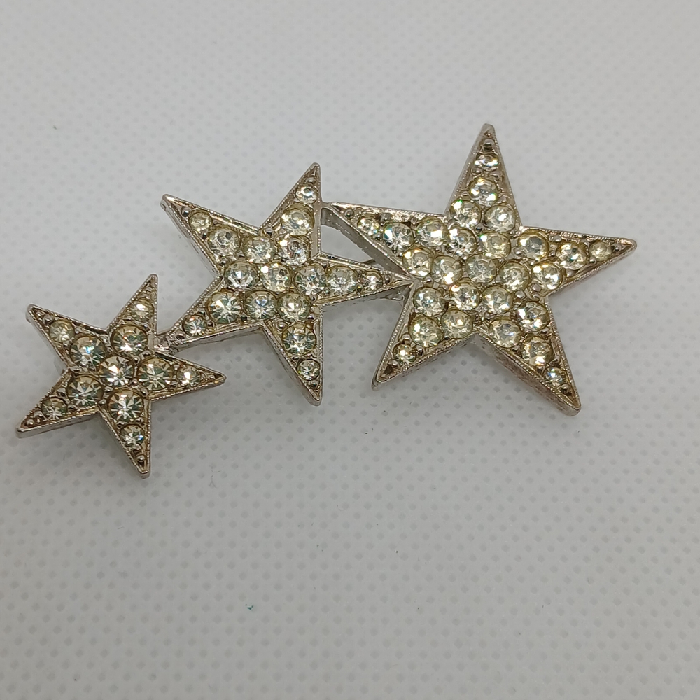 Elegant Silver Star Brooch with Crystals